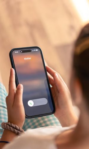 smartphone-child-hands-with-incoming-mother-call-screen_169016-43111